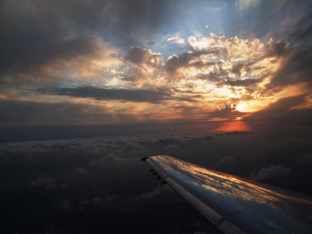 Plane Wing in the Clouds