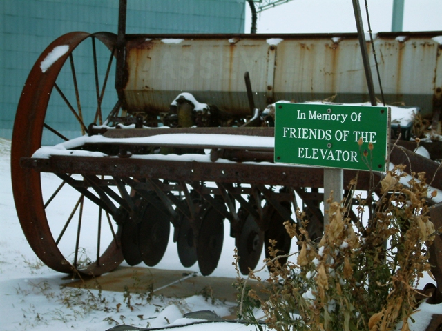 Old farm equipment near Leduc Elevator in Alberta by Sheree Zielke