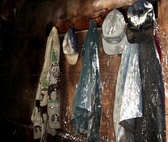 Deserted workclothes in old farm house